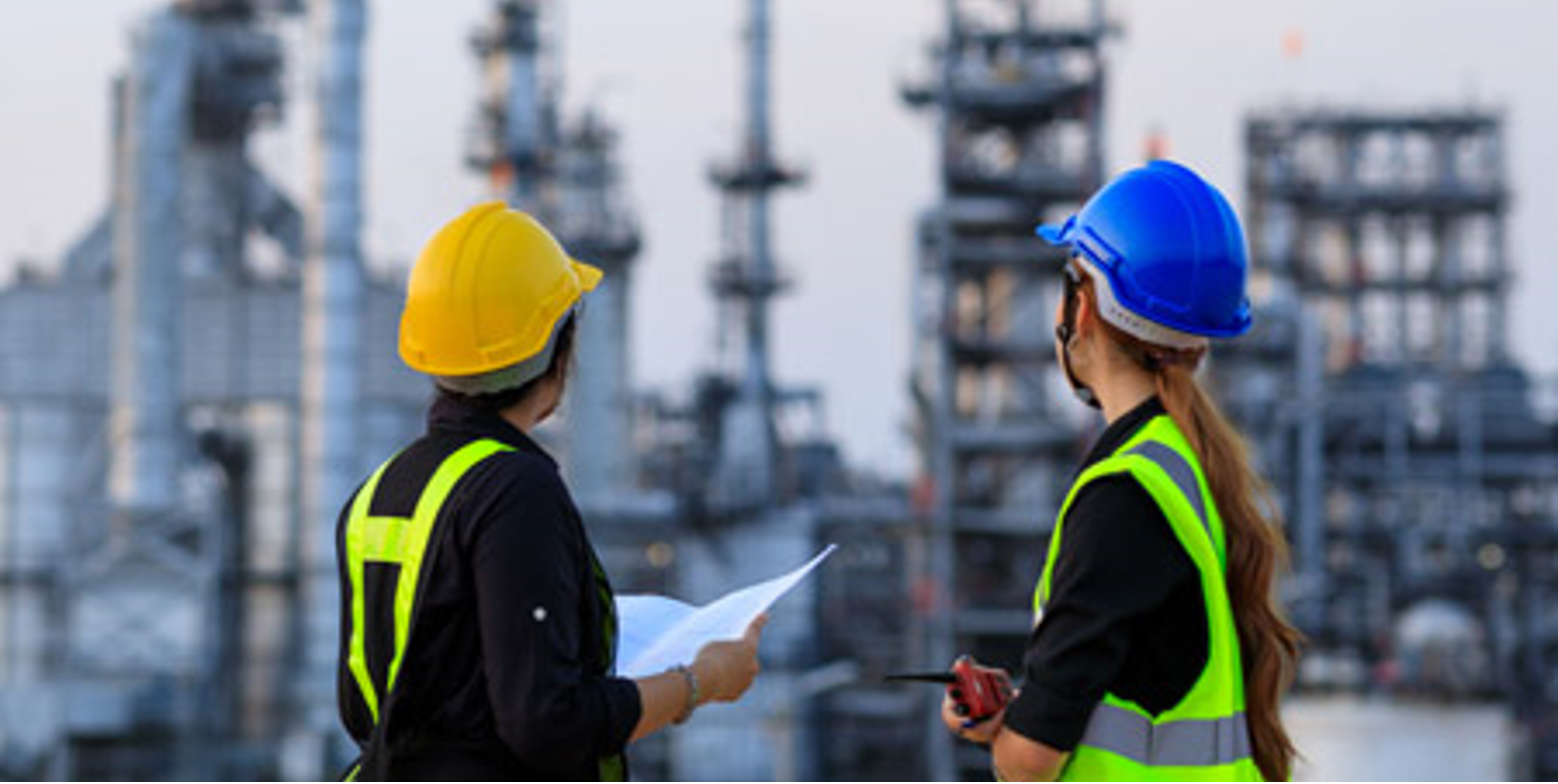 Two Workers Observe Oil Sands Worksite